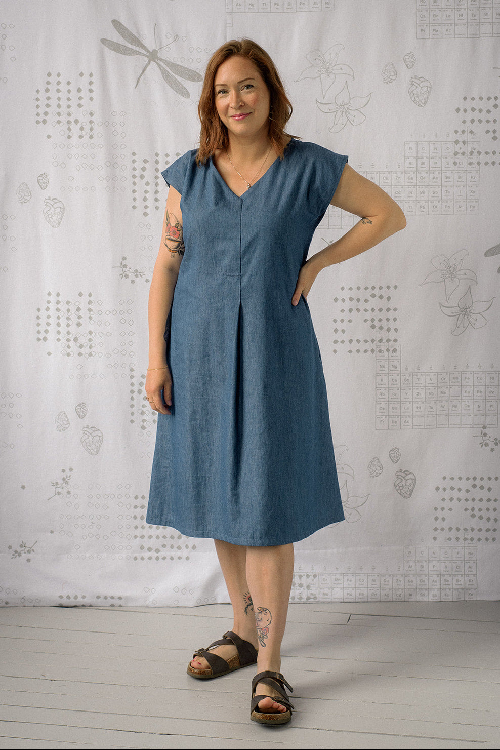 Woman wearing denim-coloured midi dress